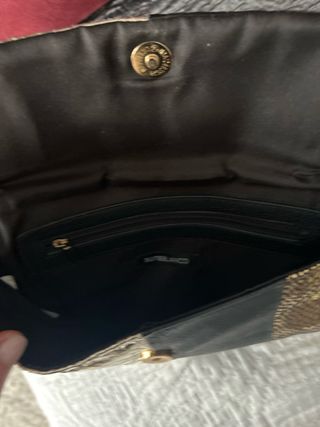 Bolso de mano patchwork dorado y negro