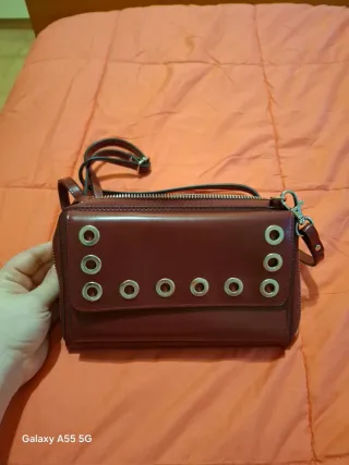 Borsa Carpisa similpelle burgundy con borchie