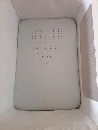 Minicuna blanca con estrellas