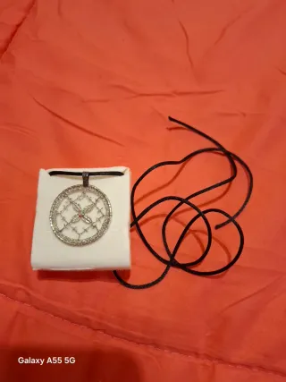 Ciondolo ricamato a mano con punto luce,artigianal