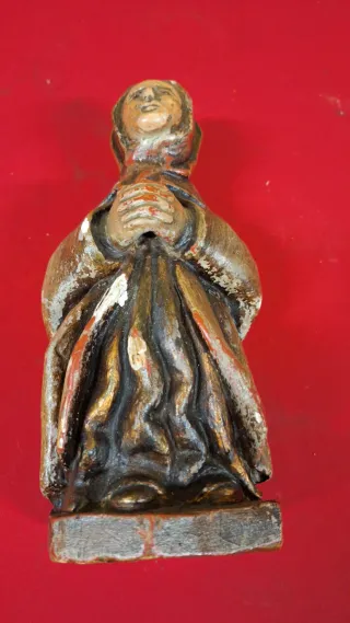 Antigua talla de madera religiosa