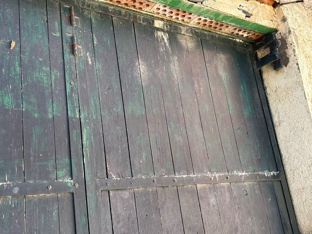 Puerta de garaje con 4 hojas de madera