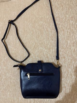 Bolso azul con asa