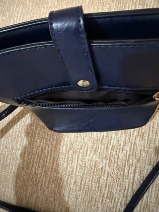 Bolso azul con asa