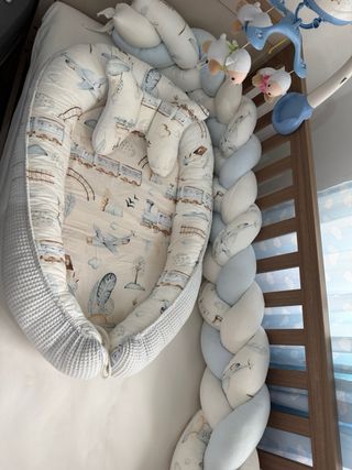 Nido reductor bebé estampado trenes y pájaros