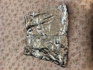 Falda lentejuelas con plumas