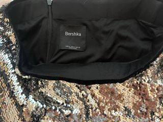 Falda lentejuelas con plumas