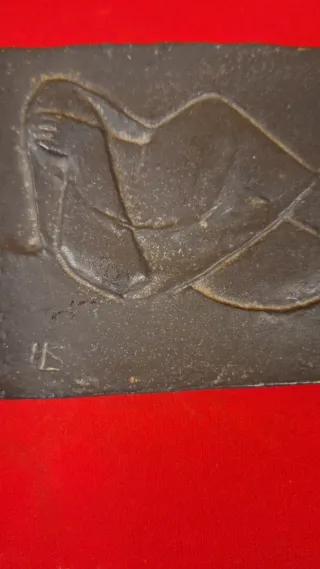 Placas/esculturas firmadas y selladas