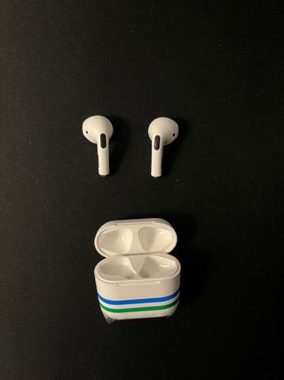 Auriculares inalámbricos blancos estilo airpods