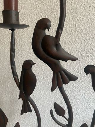 Candelabro en metal con pájaros