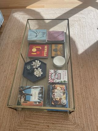 Mesa de centro de cristal y metal dorado