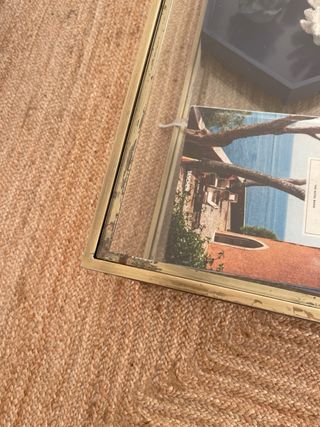 Mesa de centro de cristal y metal dorado