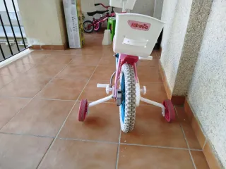 Bici infantil niña Minnie Mouse rosa paseo