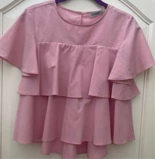 Blusa rosa con volantes