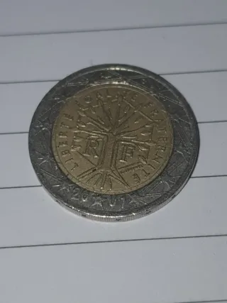 Moneda 2 euros con  error impresión  R F 2001
