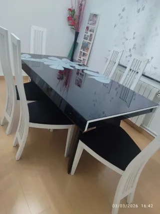 Mesa de cristal con 6 sillas