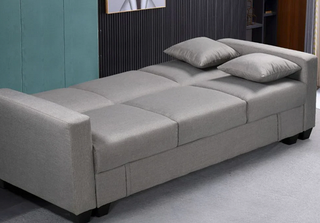 Sofá cama azul con arcón