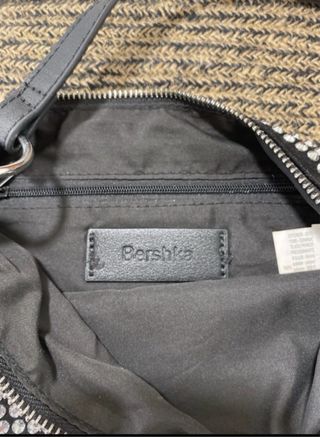 Bolso brillante negro y plateado