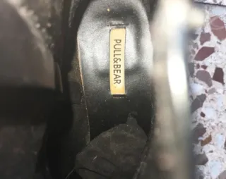 Botines piel negros punta dorada