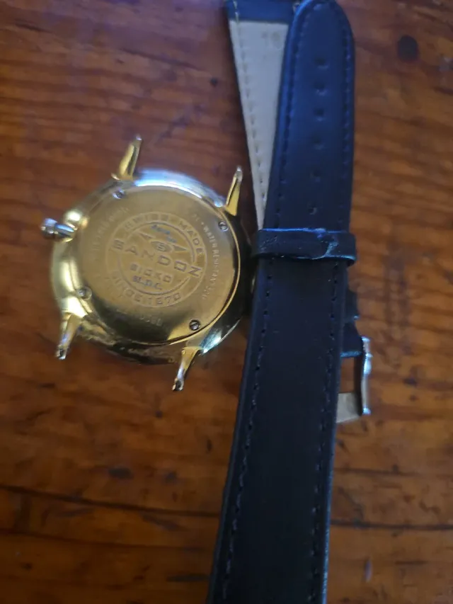 Reloj Sandoz Dorado y Blanco