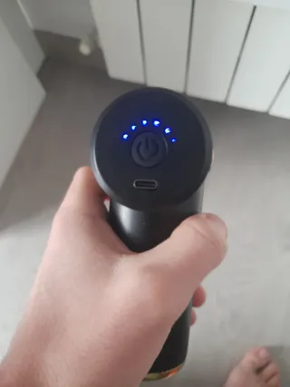 Pistola Masajeador Muscular Negro Dorado