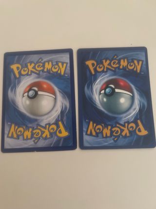 2 Cartas Pokémon Machamp GX y Reshiram GX