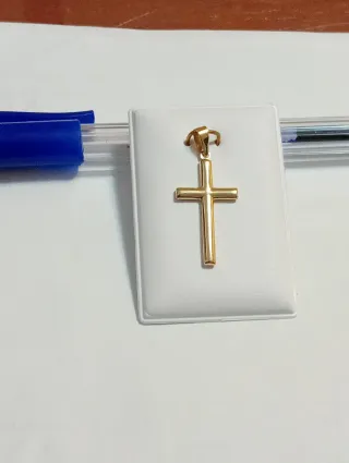 Cruz de oro 18 quilates.