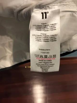 Chaqueta de invierno blanca con capucha 11°