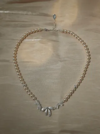 Collana perle 6mm crema 42cm con fiocchi