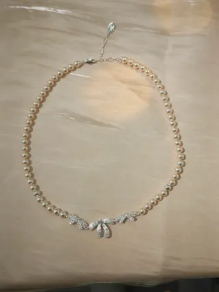 Collana perle 6mm crema 42cm con fiocchi