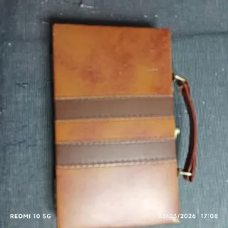 Maletín con dominó de hueso