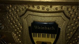 Piano vertical madera oscura