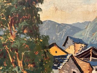 Cuadro de pueblo en montaña.