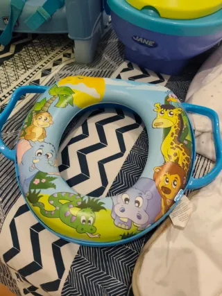 Lote artículos bebé: cojín, orinal, trona