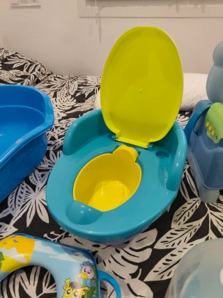 Lote artículos bebé: cojín, orinal, y más