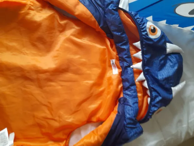 Chaleco Dinosaurio Infantil y paraguas