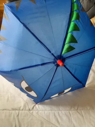 Chaleco Dinosaurio Infantil y paraguas