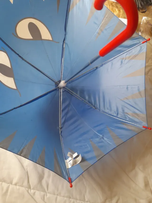 Chaleco Dinosaurio Infantil y paraguas