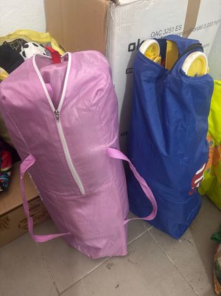 2 Cunas de Viajes rosa asalvo Y otra azul y verde