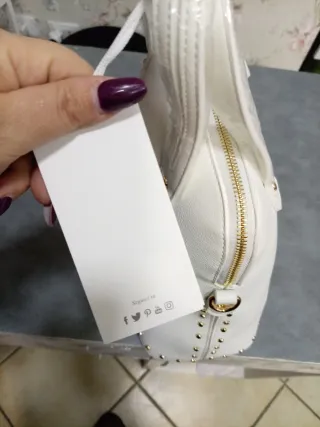 Borsa donna Cafènoir bianca con borchie oro