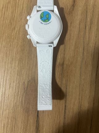 Swatch Omega Mission to EarthPhase Moonshine Gold