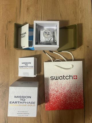 Swatch Omega Mission to EarthPhase Moonshine Gold