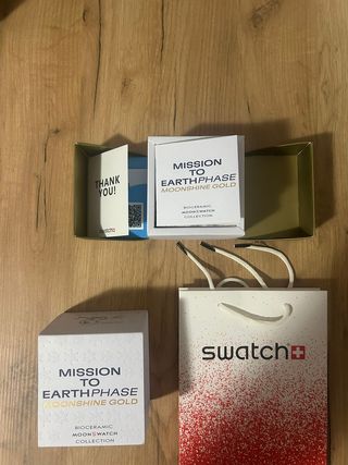 Swatch Omega Mission to EarthPhase Moonshine Gold