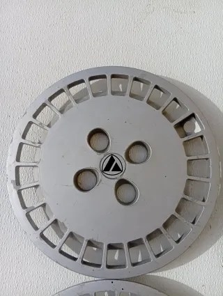 Tapacubos Autobianchi Y10...