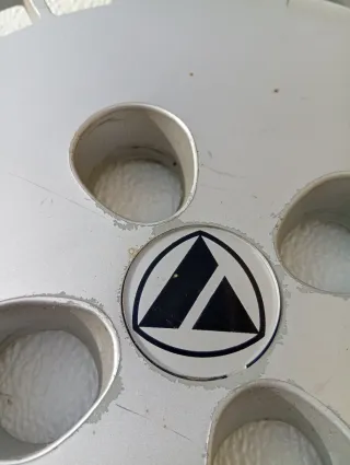 Tapacubos Autobianchi Y10...