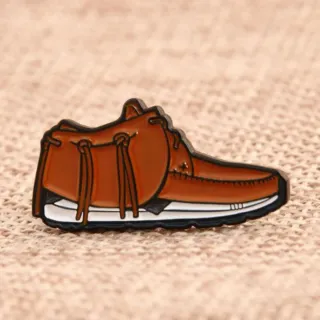 Pin zapato mocasín marrón