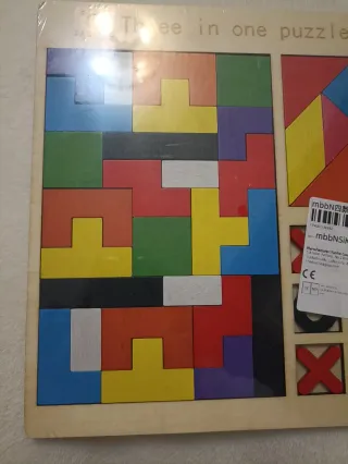 Juego de mesa Three in one puzzle toy.