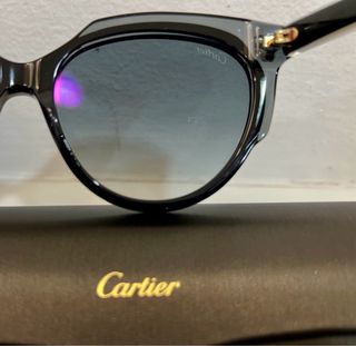 Gafas de sol Cartier negras y doradas