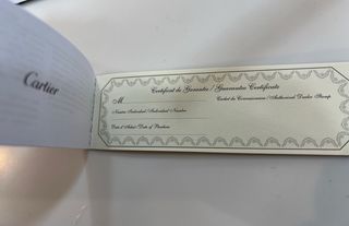 Gafas de sol Cartier negras y doradas