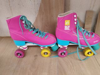 Patines rosas y casco de skate talla 39